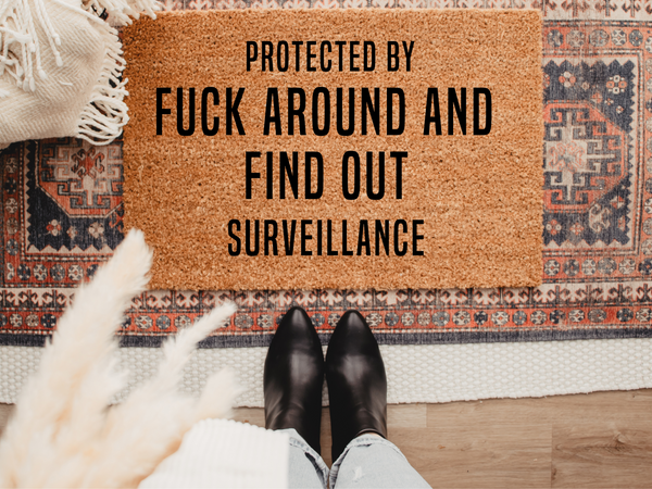 Protected by fuck around and find out surveillance sign